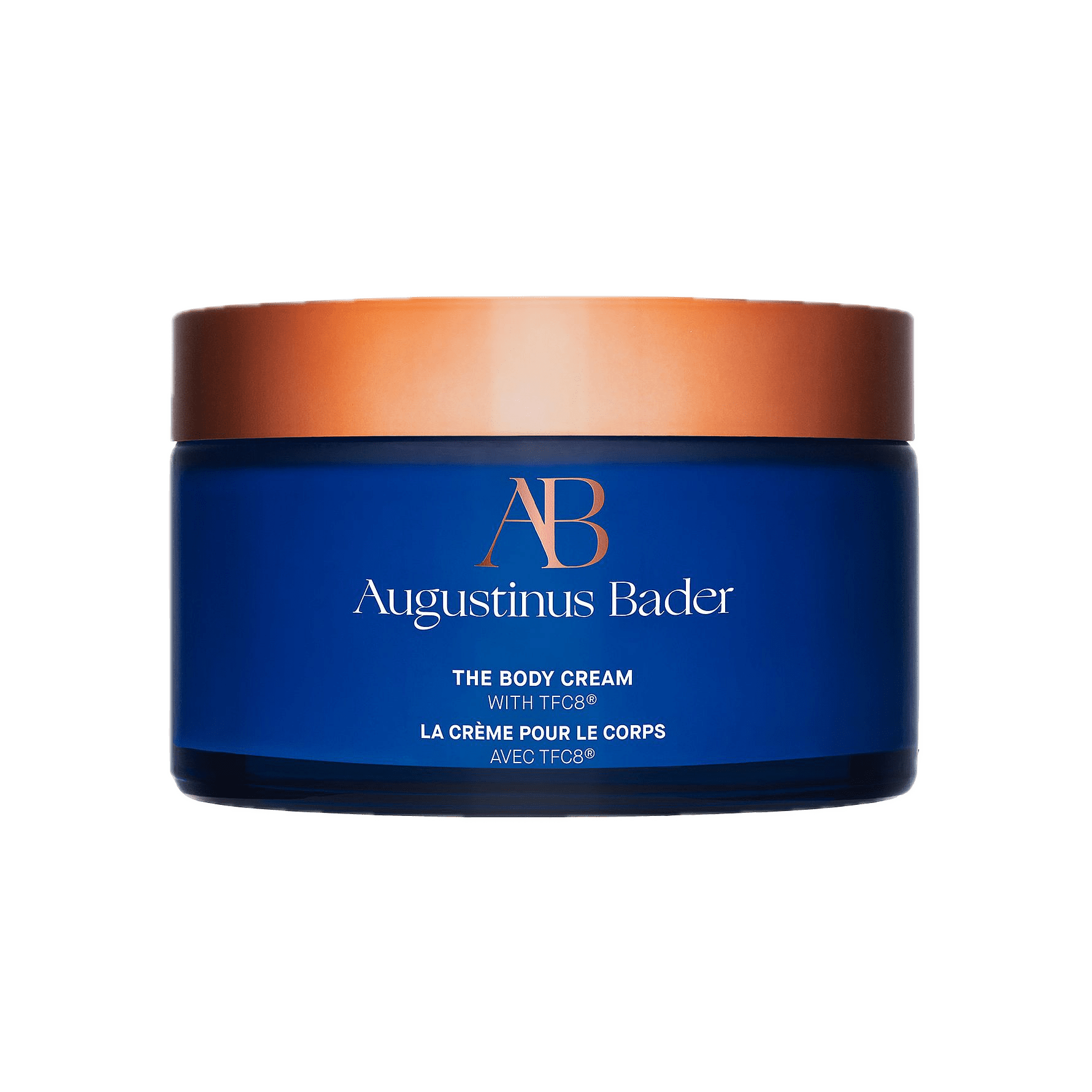 Blå krukke med Augustinus Bader Body Cream, kobberfarget lokk, bakgrunn fjernet.